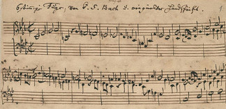 Alte handschriftliche Notenseite eines Musikstücks von Johann Sebastian Bach.